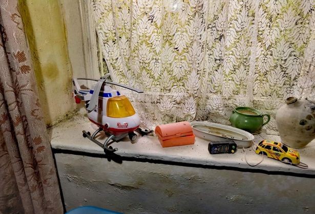 More children's toys were found around the property like this helicopter and car ( Image: @nolimits urbex/mediadrumworld.c)