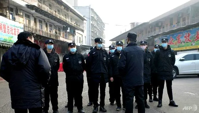 pneumonia virus spreads to beijing and shenzhen china confirms 139 new cases