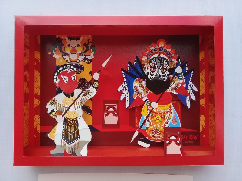 young student enlivens traditional theatre figures