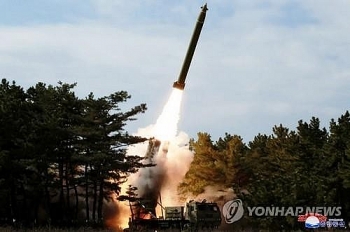 N.Korea fires 3 unidentified projectiles as S.Korea confirms more coronavirus cases