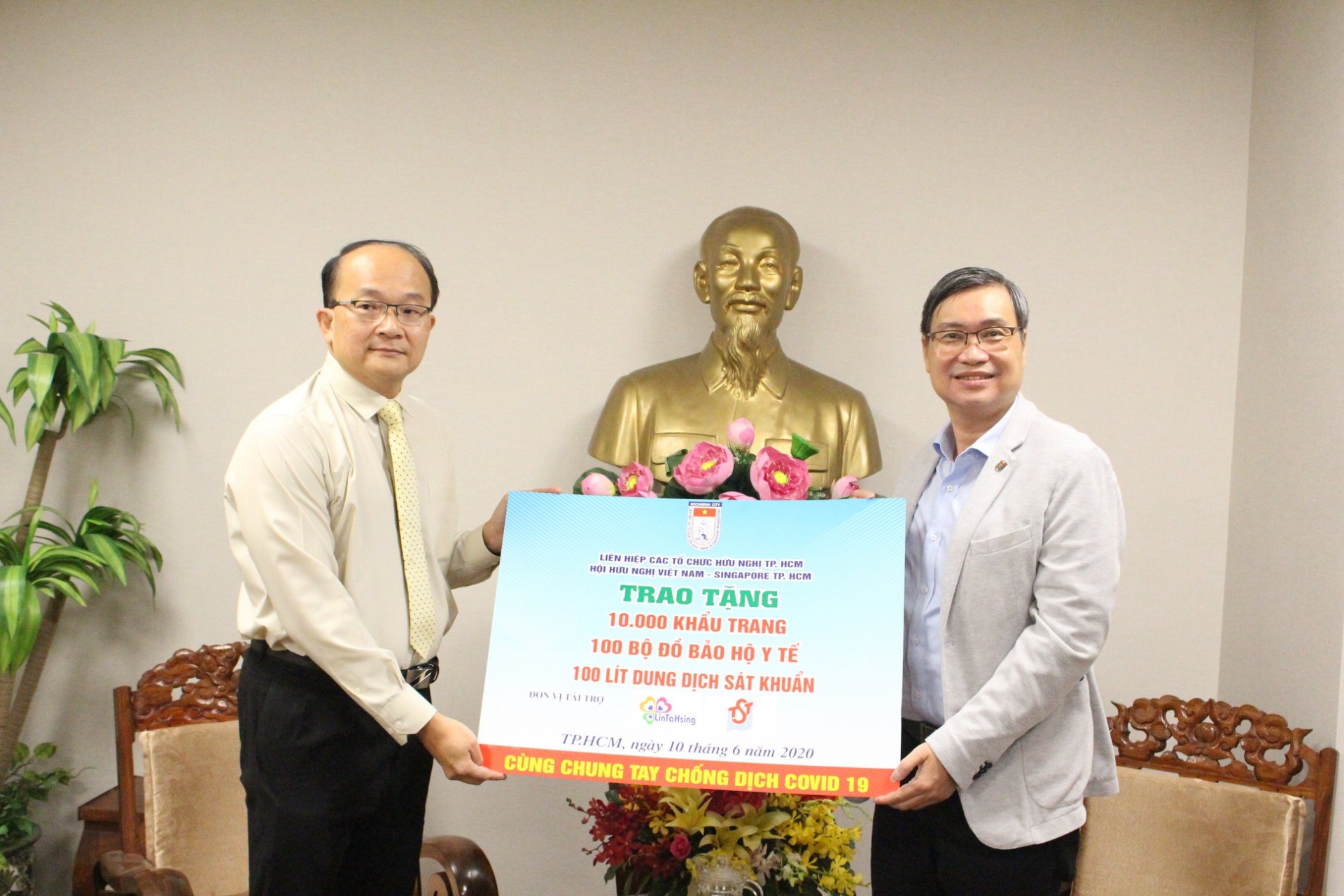 Presenting medical supplies in support of Singapore against COVID-19 epidemic