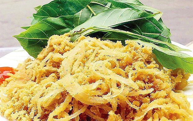 A Delicacy of Hanoi: Nem Phung (Fermented Pork) With Cluster Fig Leaves