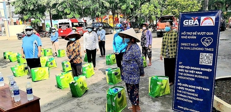 Local Friendship Unions Support Struggling People in Vietnam's 2 Biggest cities