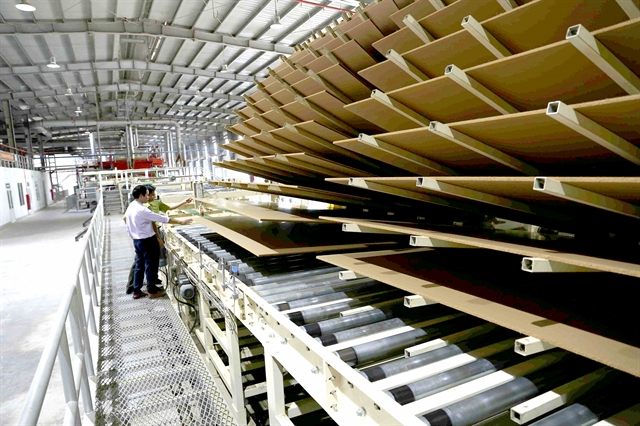A medium density fibreboard (MDF) production line of Thanh Thành Đạt MDF Joint Stock Company in the central province of Hà Tĩnh. The country exported $9.69 billion worth of agricultural and forestry products in the first five months of 2021, up 13.5 per cent. — VNA/VNS Photo Vũ Sinh