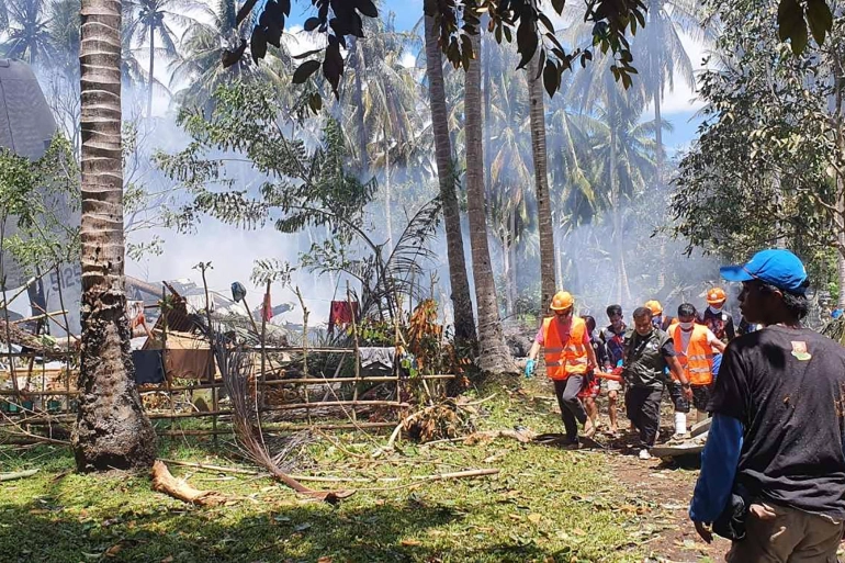 he C-130 crashed while attempting to land during the weekend. Authorities have recovered a black box from the scene [Joint Task Force-Sulu via AFP]