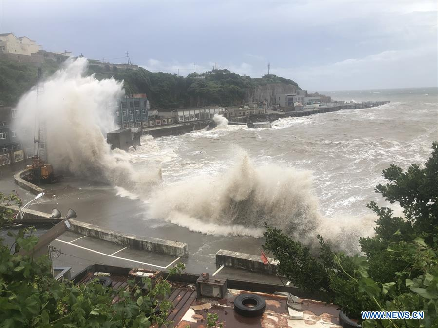 hagupit lashes eastern china with flooding rain strong winds as it creates rough seas
