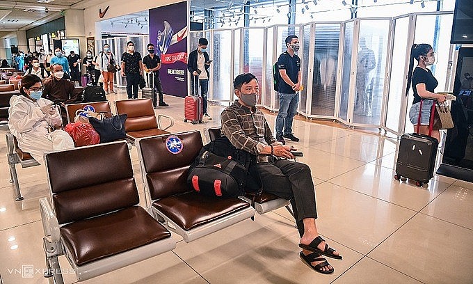 Passengers wait for boarding at Hanoi's Noi Bai International Airport, Oct. 10, 2021. Photo by VnExpress/Giang Huy