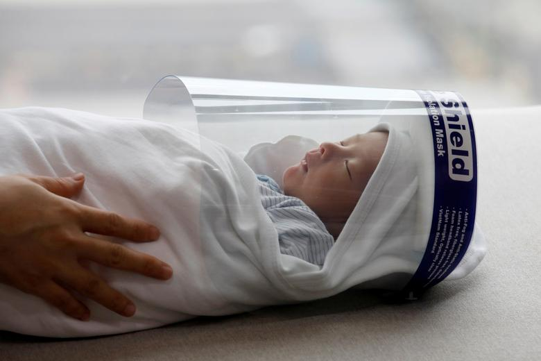 Reuters features Vietnamese newborn face shield in its “Pictures of the year”