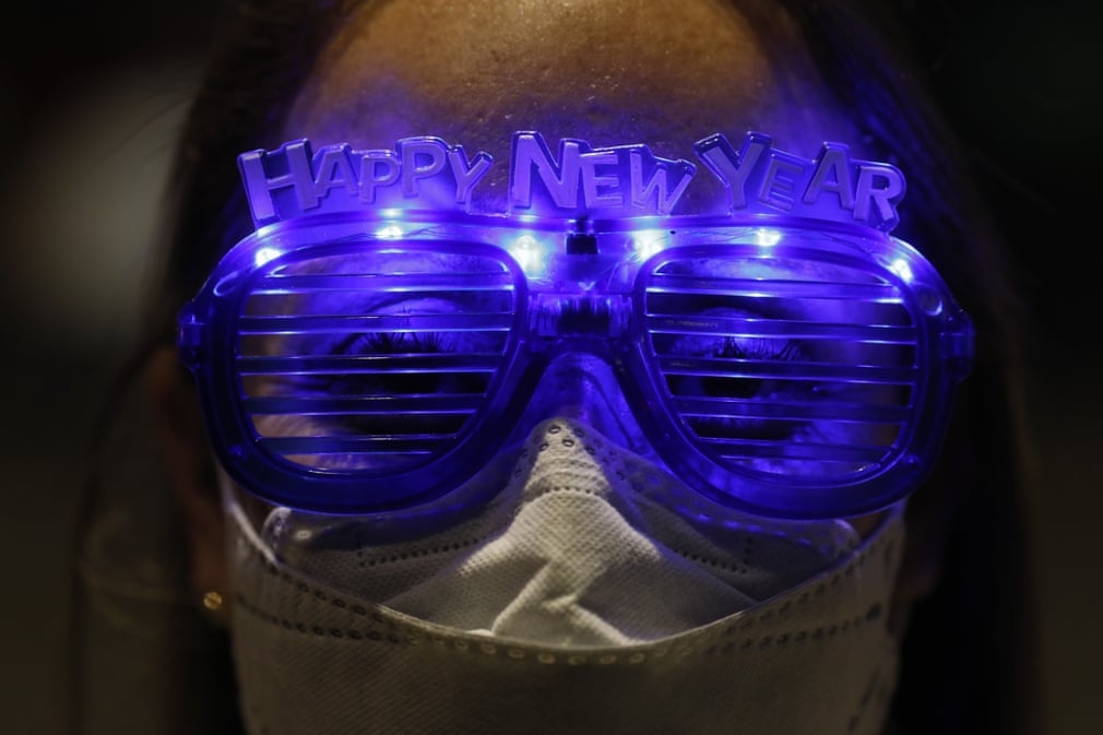 in photos new years eve around the world with pandemic controlling muting celebrations