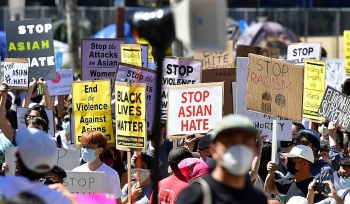 asian american attacks rallies protesters against racially motivated violence witness widespread participation