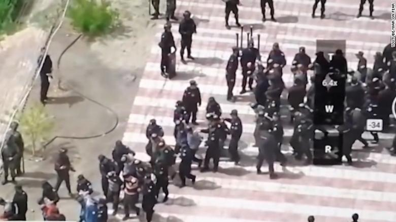 blindfolded uighurs prisoners footage challenges china with human right abuse accusation
