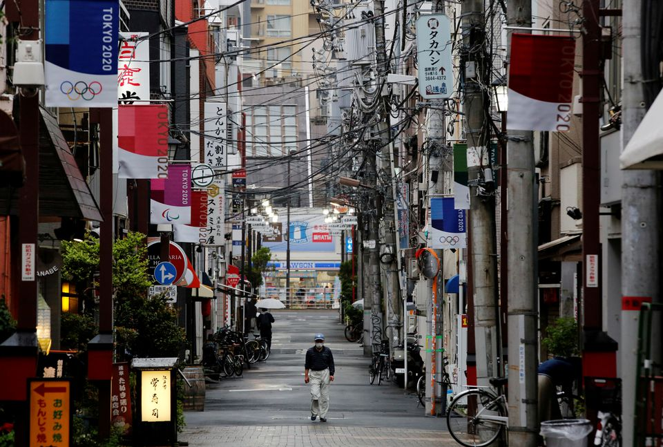 severe covid 19 cases surge in tokyo while new tropical storm spares olympics
