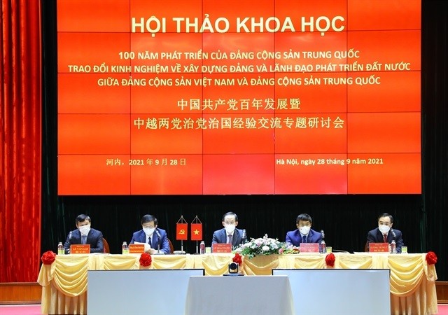 Vietnam, China Exchanges Experience in Party Building and National Development