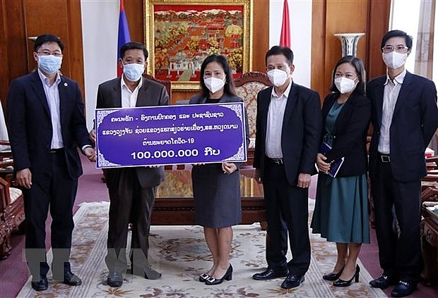 overseas vietnamese in japan laos support covid 19 vaccine fund
