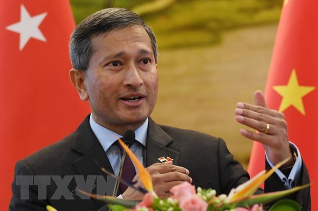 singapore commits to close cooperation with vietnam to recover from covid 19