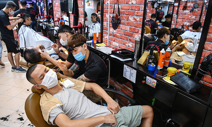 vietnam news today june 22 hanoi reopens barber shops indoor dining