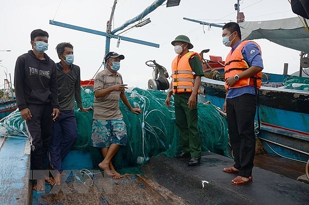 Vietnam's Border Patrol, Fishermen Team Up on the High Seas