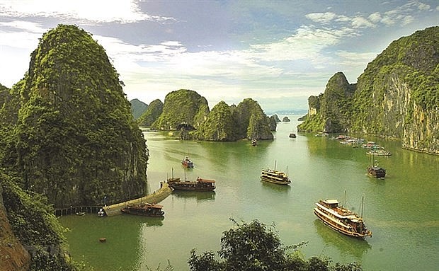 Ha Long Bay is a famous UNESCO World Heritage site featuring thousands of beautiful limestone karsts. Photo: VNA