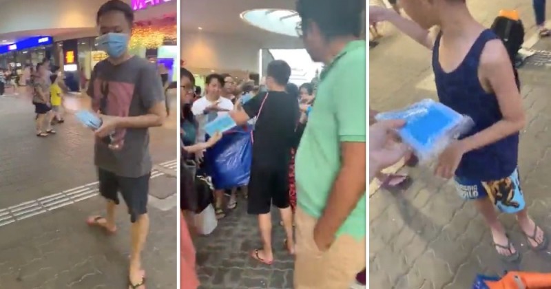 sporean man and vietnamese wife give out 17000 free masks in singapore mrt