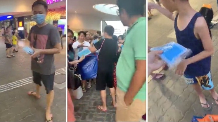 sporean man and vietnamese wife give out 17000 free masks in singapore mrt