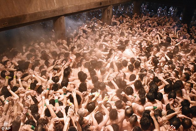 japanese festival sees thousands of men naked