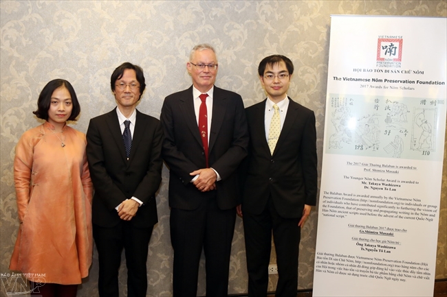 japanese professor honoured for helping to preserve nom script