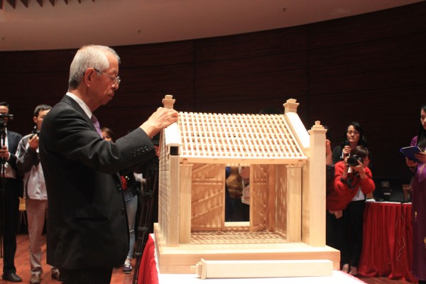 japanese architect makes model of vietnamese village gate