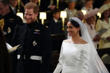 newlyweds harry and meghan process through windsor