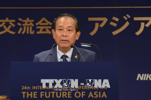 deputy pm truong hoa binh busy in japan