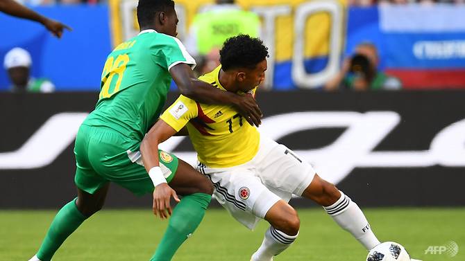 colombia and japan qualify for world cup last 16
