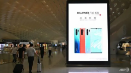 huawei is readying possible hongmeng software roll out says companys executive