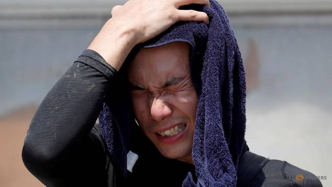 heatwave blankets japan kills 14 people over long weekend