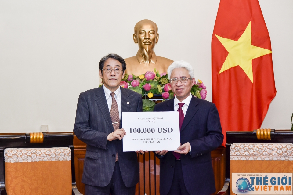 usd 100000 donated to disaster victims in japan
