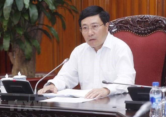 deputy pm pham binh minh instructs preparations for wef asean
