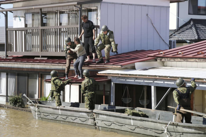 At least 35 killed and 17 missing after Typhoon Hagibis tears through Japan