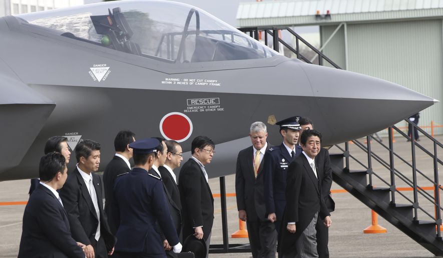 japanese government approves record military spending